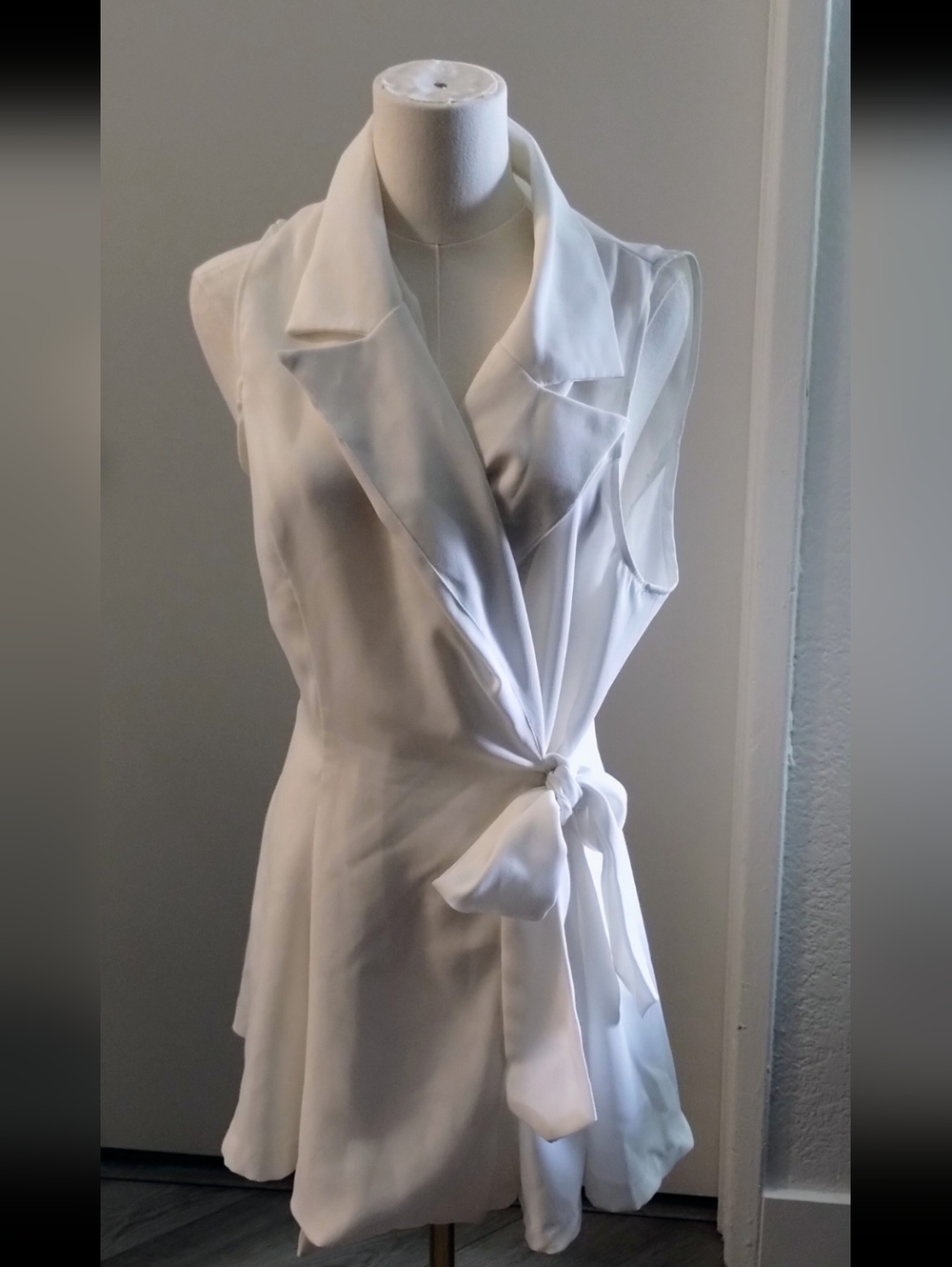 Sleeveless White Wrap Blouse with Tie Front